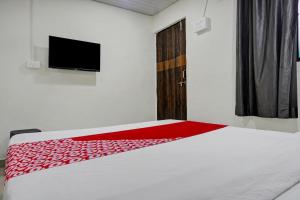 Postel nebo postele na pokoji v ubytování Hotel O Metro View