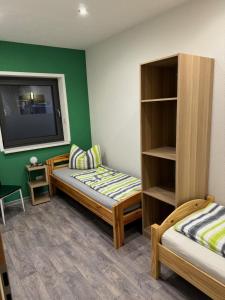 Postel nebo postele na pokoji v ubytování Ferienwohnung Zeitler