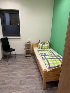 Postel nebo postele na pokoji v ubytování Ferienwohnung Zeitler
