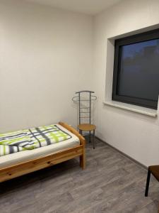 Postel nebo postele na pokoji v ubytování Ferienwohnung Zeitler
