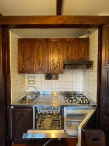 Nhà bếp/bếp nhỏ tại Appartamento Sestriere in residence per 6 Persone +11 ảnh