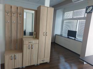 TV i/ili multimedijalni sistem u objektu Apartmani Kuzman