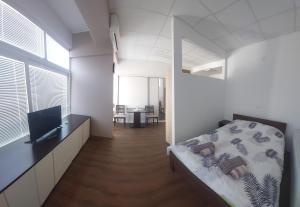 Krevet ili kreveti u jedinici u okviru objekta Apartmani Kuzman
