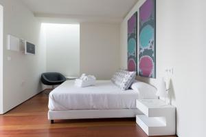Posteľ alebo postele v izbe v ubytovaní Hotel Viento10