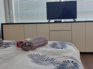 Krevet ili kreveti u jedinici u okviru objekta Apartmani Kuzman