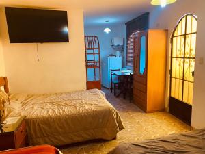Postel nebo postele na pokoji v ubytování Cieneguilla MolinoVerde + 37 fotografií