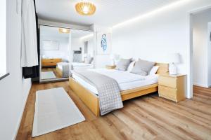 Ένα ή περισσότερα κρεβάτια σε δωμάτιο στο Apartment Schlossberg