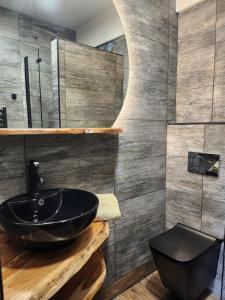 Koupelna v ubytování Apartmán Refrino na jedinečném místě