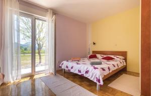 Posteľ alebo postele v izbe v ubytovaní Two-Bedroom Holiday Home In Stasevica