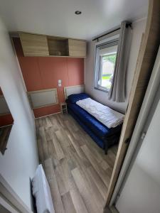 Postel nebo postele na pokoji v ubytování Chalet tussen Zee en Meer