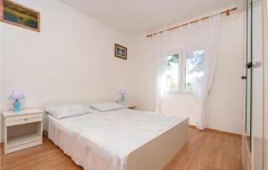 Posteľ alebo postele v izbe v ubytovaní Holiday Home Vinacac Bb Iii