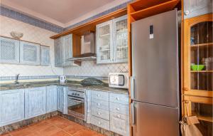 Kuchyňa alebo kuchynka v ubytovaní Nice Home In Malaga With Jacuzzi