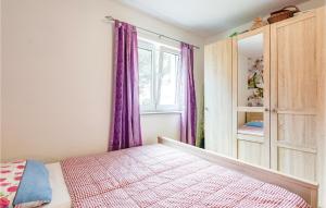 Postel nebo postele na pokoji v ubytování Holiday Home Valbandon I