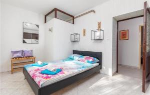 Łóżko lub łóżka w pokoju w obiekcie 2 Bedroom Awesome Home In Vodnjan
