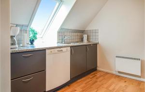 Kuchyň nebo kuchyňský kout v ubytování Apartment Blåvandvej Blåvand Iv