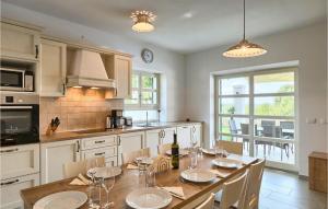 a kitchen with a table with wine glasses on it at Villa Lisa in Poreč