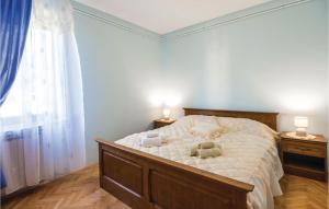 Posteľ alebo postele v izbe v ubytovaní Nice Apartment In Veprinac With Wifi