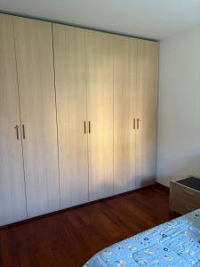 Letto o letti in una camera di DepaHOME