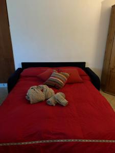 Letto o letti in una camera di DepaHOME