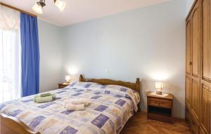 Posteľ alebo postele v izbe v ubytovaní Nice Apartment In Veprinac With Wifi