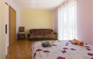 Posteľ alebo postele v izbe v ubytovaní Two-Bedroom Holiday Home In Stasevica