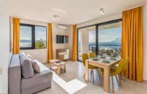 a living room with a couch and a table at Gorgeous Home In Brela in Brela