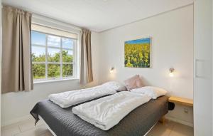 Postel nebo postele na pokoji v ubytování Holiday Home Strandgårdsvej Bagenkop X