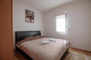 Ένα ή περισσότερα κρεβάτια σε δωμάτιο στο PeSa house +19 φωτογραφίες