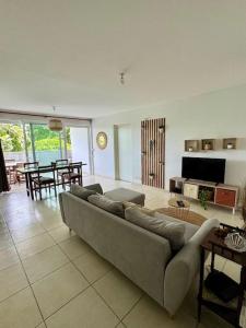 Posezení v ubytování Appartement Floralia, T3 près du Jardin de Balata