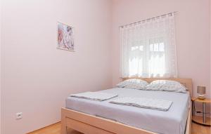 Posteľ alebo postele v izbe v ubytovaní Apartment Vodice With Sea View 11