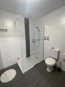 Ένα μπάνιο στο Ferienwohnung Karlstadt +14 φωτογραφίες