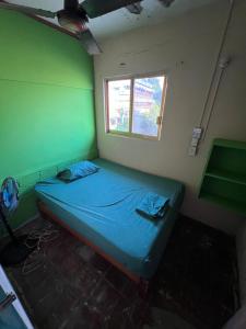 Uma cama ou camas num quarto em Pipeline Hostel