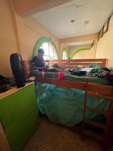 Uma cama ou camas num quarto em Pipeline Hostel