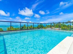 Swimmingpoolen hos eller tæt på FLAT PÉ NA AREIA Carneiros Tamandaré