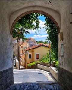 an archway over a street in a city at Il Fauno in Contursi Terme