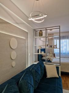 Ένα ή περισσότερα κρεβάτια σε δωμάτιο στο APARTMAN PLAVA LAGUNA -Crnjanski