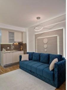 Η κουζίνα ή μικρή κουζίνα στο APARTMAN PLAVA LAGUNA -Crnjanski