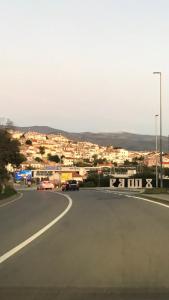 a view of a road with a city in the background at Gente di mare in Novi Vinodolski +13 photos