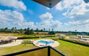 an overhead view of a swimming pool in a park at Gavoa Resort Flat - Mar Doce Lar in Igarassu
