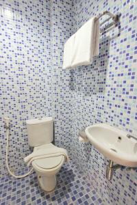 Koupelna v ubytování Rivisha Hotel