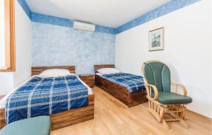En eller flere senge i et værelse på Holiday Home Vodice 12