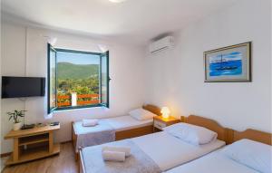 Posteľ alebo postele v izbe v ubytovaní Two-Bedroom Holiday Home In Zastrazisce