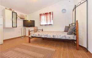 Postel nebo postele na pokoji v ubytování Holiday Home Jezera With Sea View I