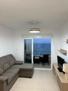 Posedenie v ubytovaní Precioso apartamento en primera linea.