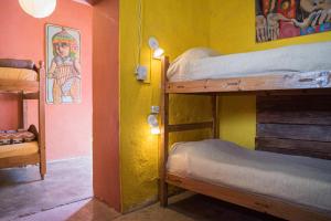 Postel nebo postele na pokoji v ubytování Hostel La Humahuacasa