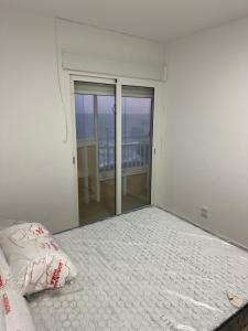 Posteľ alebo postele v izbe v ubytovaní Precioso apartamento en primera linea.