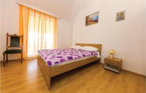 Postel nebo postele na pokoji v ubytování Apartment Trogir Ul, F,tudmana