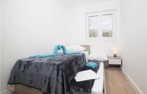 Posteľ alebo postele v izbe v ubytovaní Two-Bedroom Apartment In Trogir