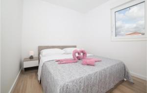 Posteľ alebo postele v izbe v ubytovaní Two-Bedroom Apartment In Trogir