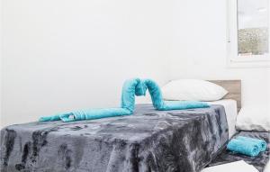 Posteľ alebo postele v izbe v ubytovaní Two-Bedroom Apartment In Trogir + 9 fotografií